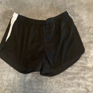 Black with white stripes athletic shorts with mesh lining. Price negotiable
